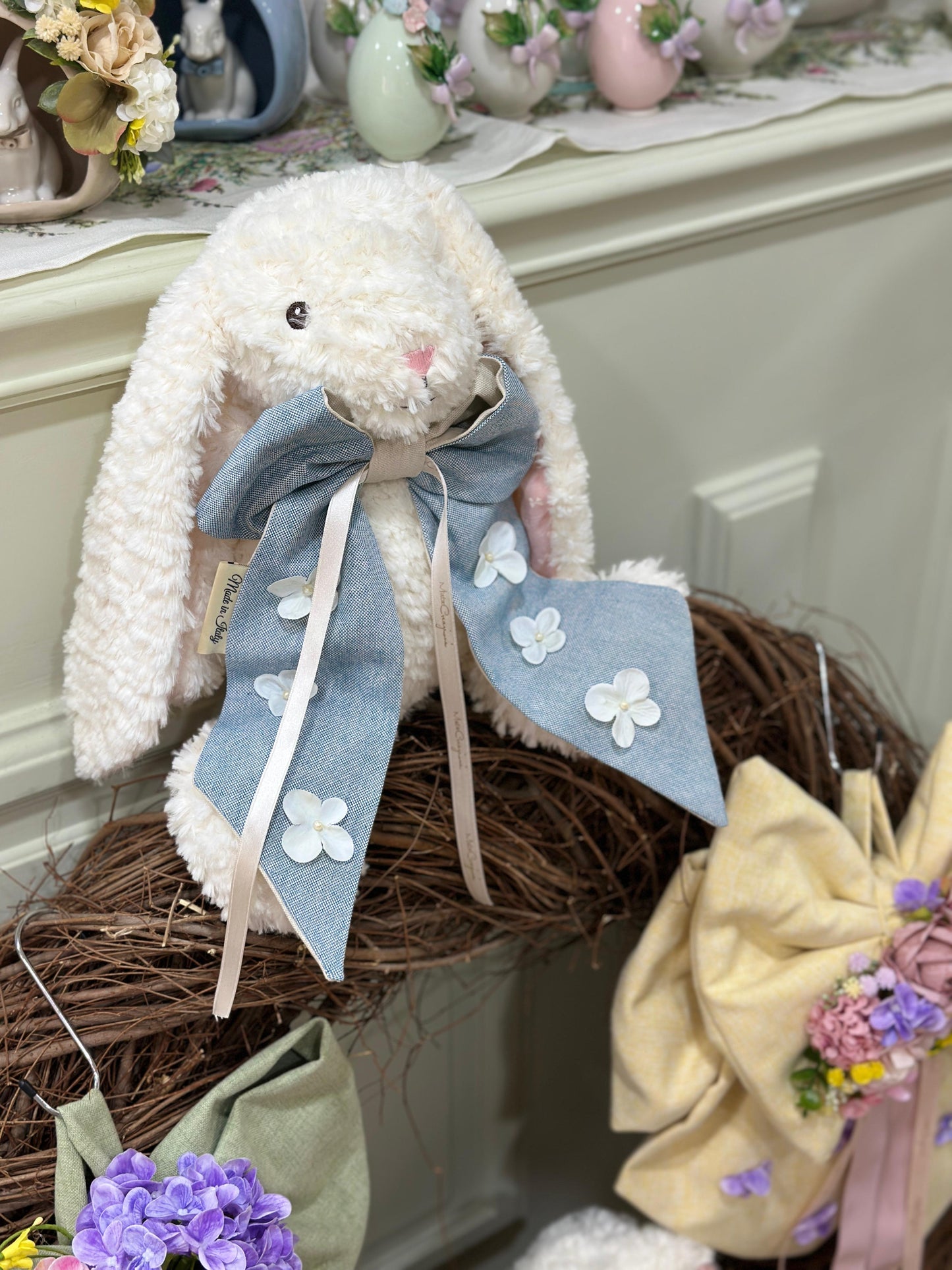 Coniglietto pupazzo con fiocco blu