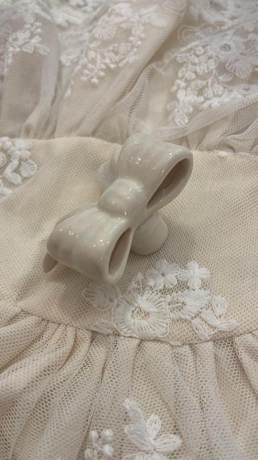 pomello decorativo in porcellana a forma di fiocco 5,5x6x3,5cm