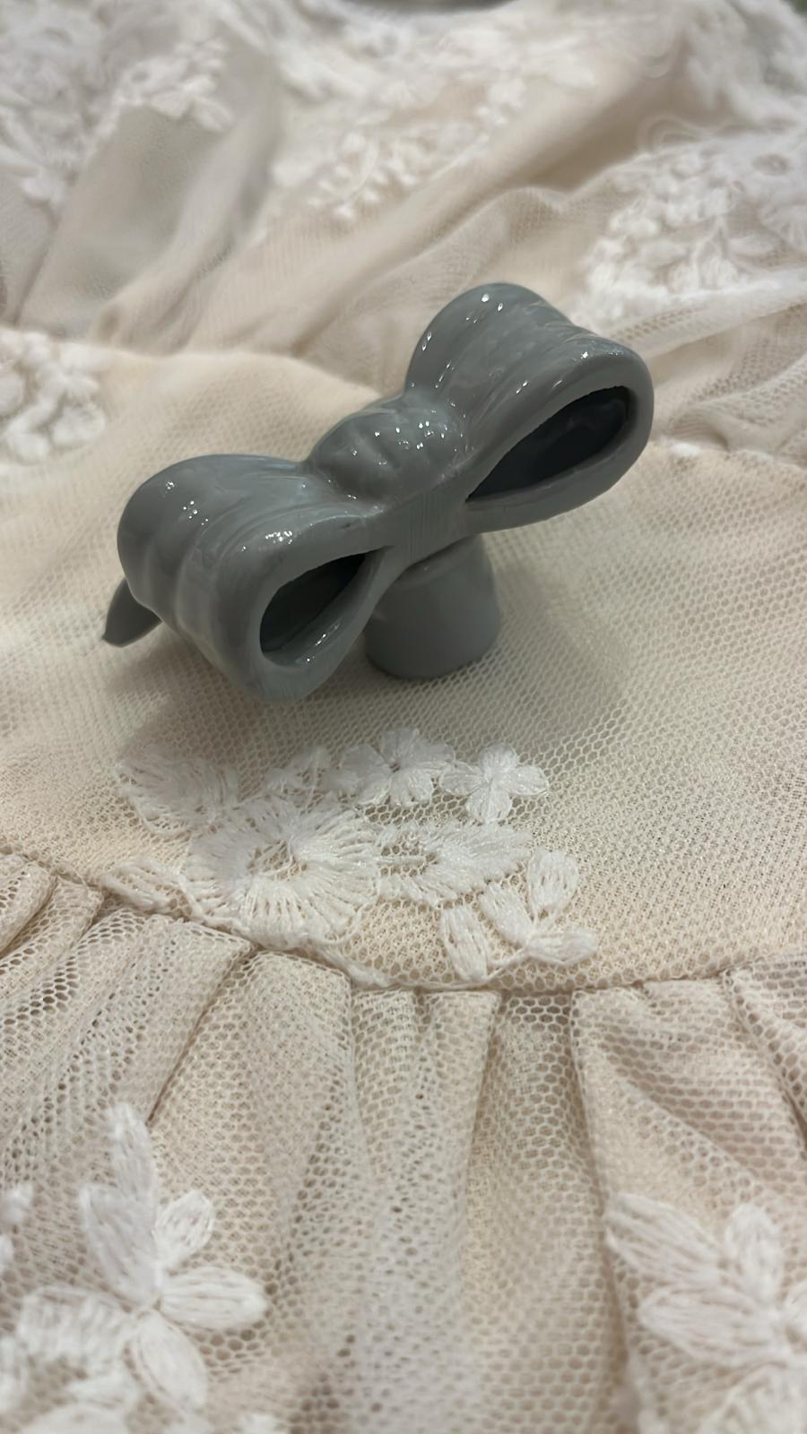 pomello decorativo in porcellana a forma di fiocco 5,5x6x3,5cm