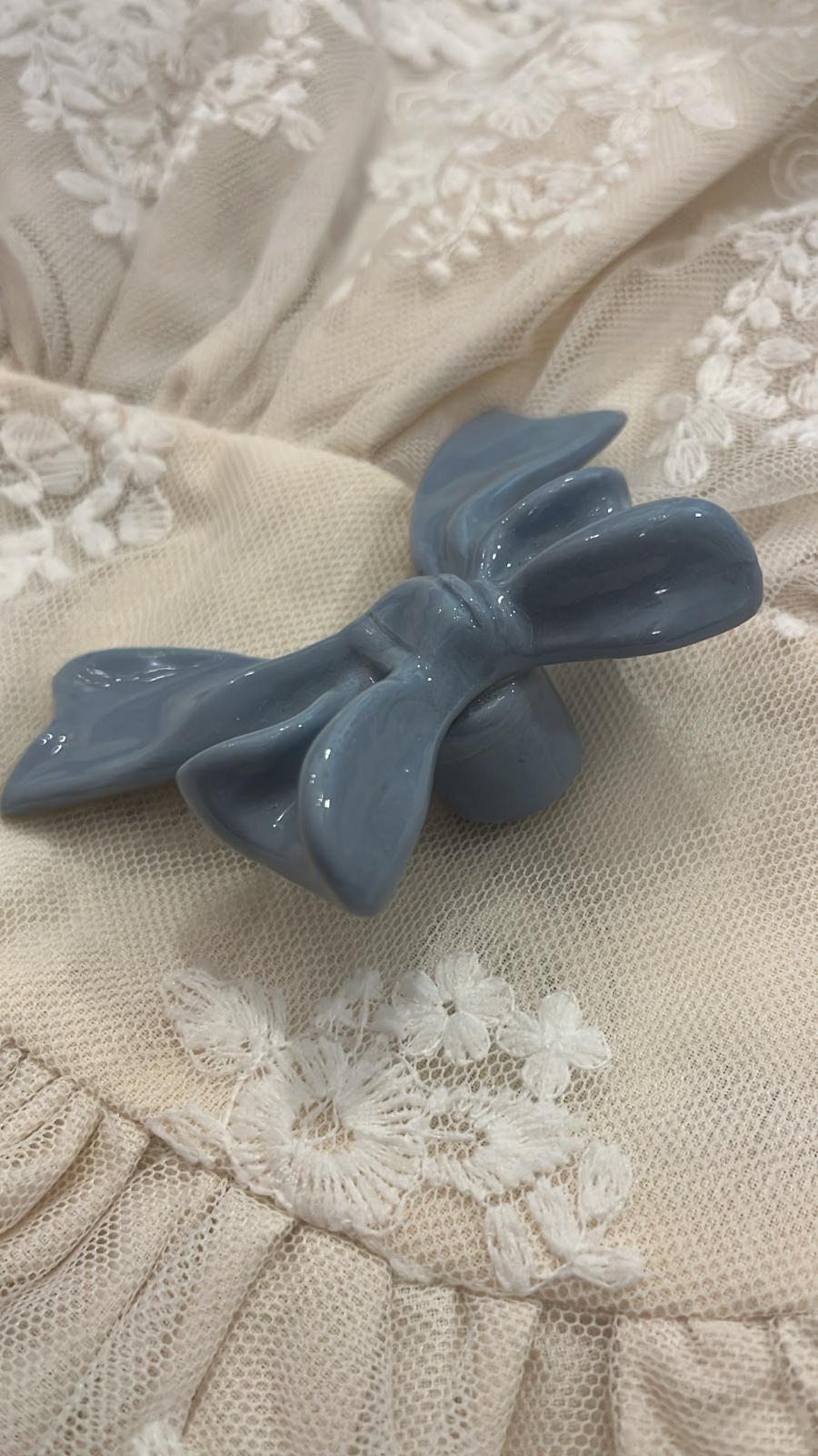 pomello decorativo in porcellana a forma di fiocco 6x6x3cm