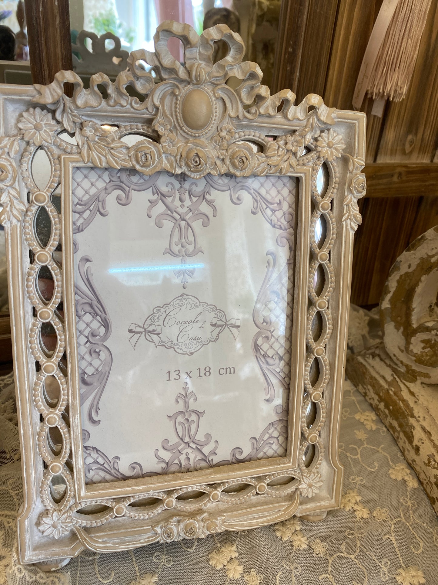 CORNICE IN RESINA CON FIOCCO MISURA 27x19