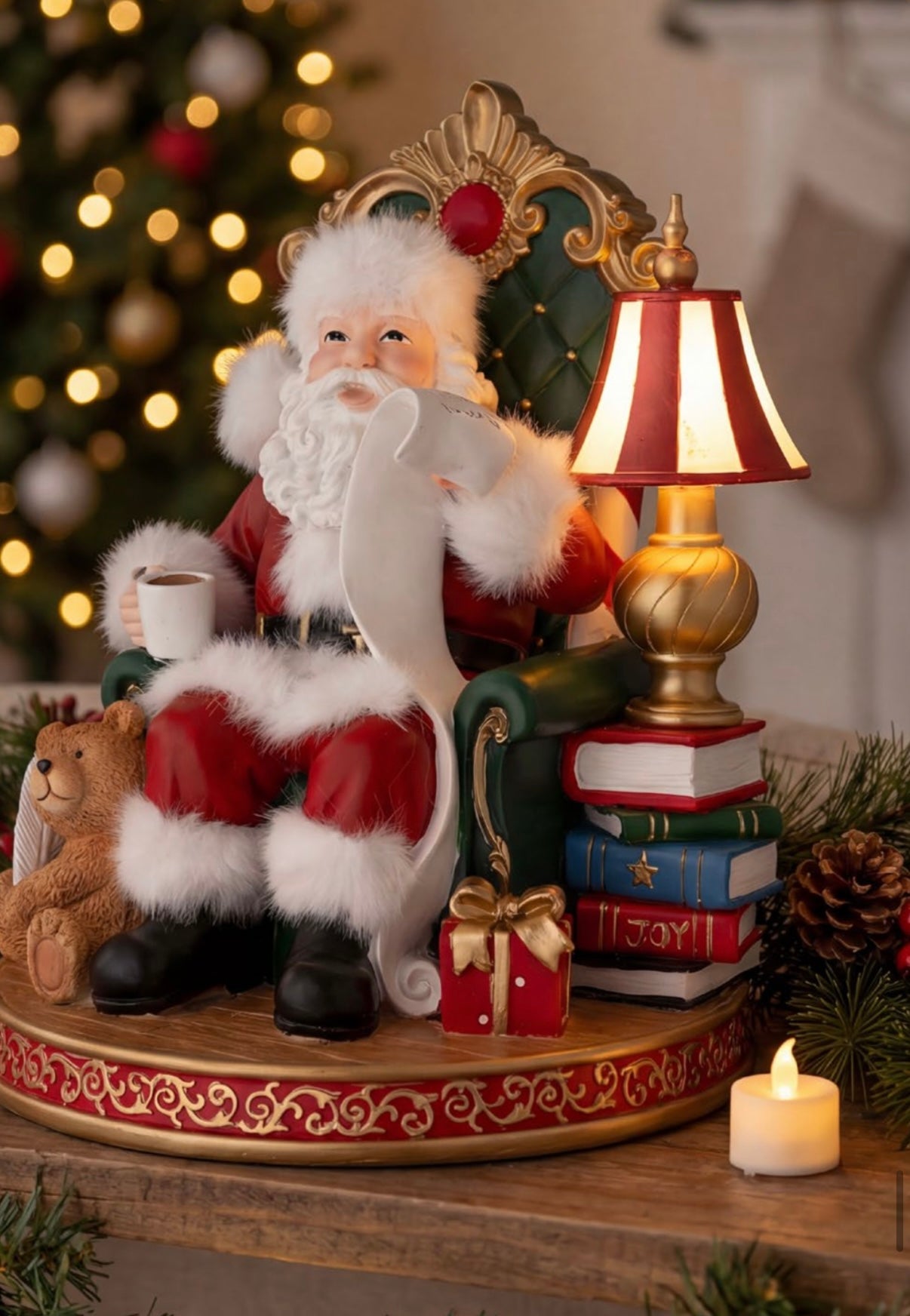 BABBO NATALE SU SOFA’ IN RESINA CON LAMPADA CHE SI ILLUMINA MISURA 22,5x22,5x28,5