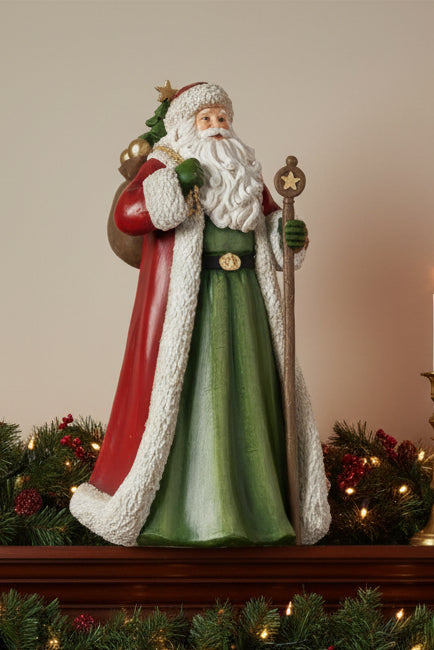 BABBO NATALE IN RESINA CON SACCO DONI ABITO COLORE VERDE MISURA 20x16x31