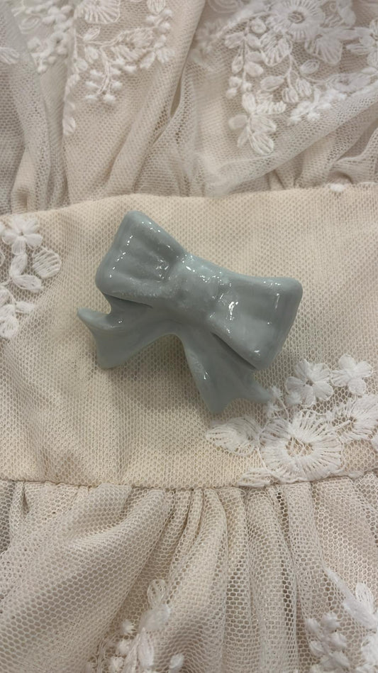 pomello decorativo in porcellana a forma di fiocco 5x5x3cm