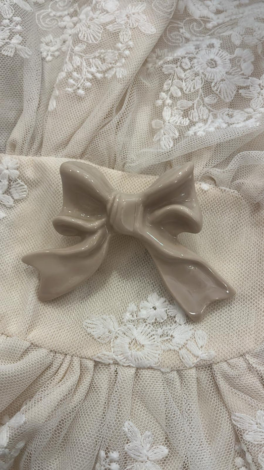 pomello decorativo in porcellana a forma di fiocco 6x6x3cm