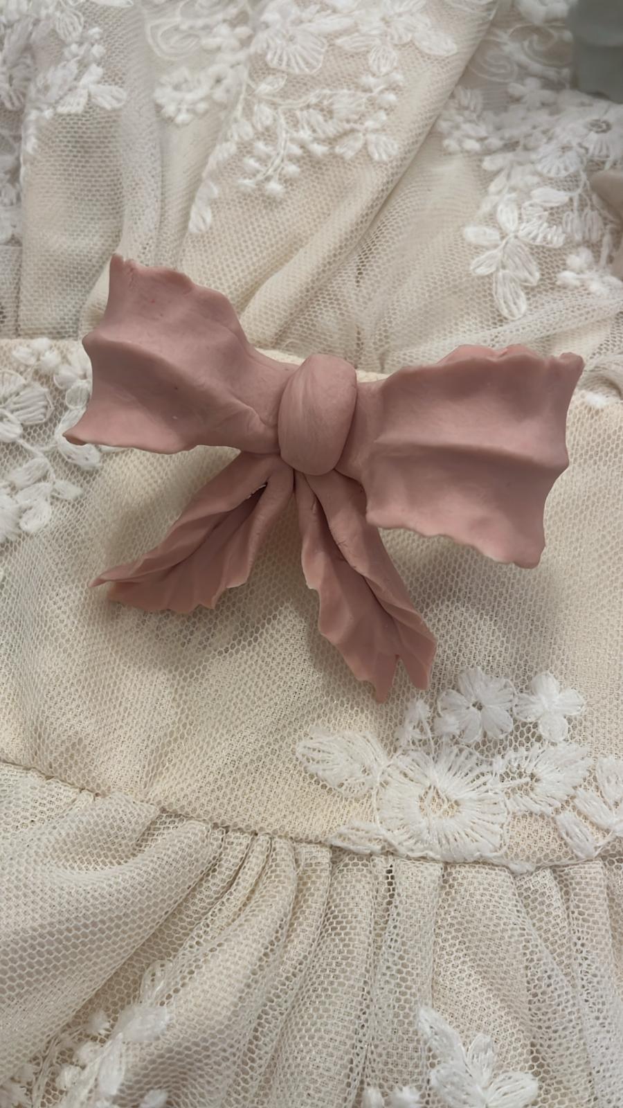 pomello decorativo in porcellana a forma di fiocco 8x6x4,5cm