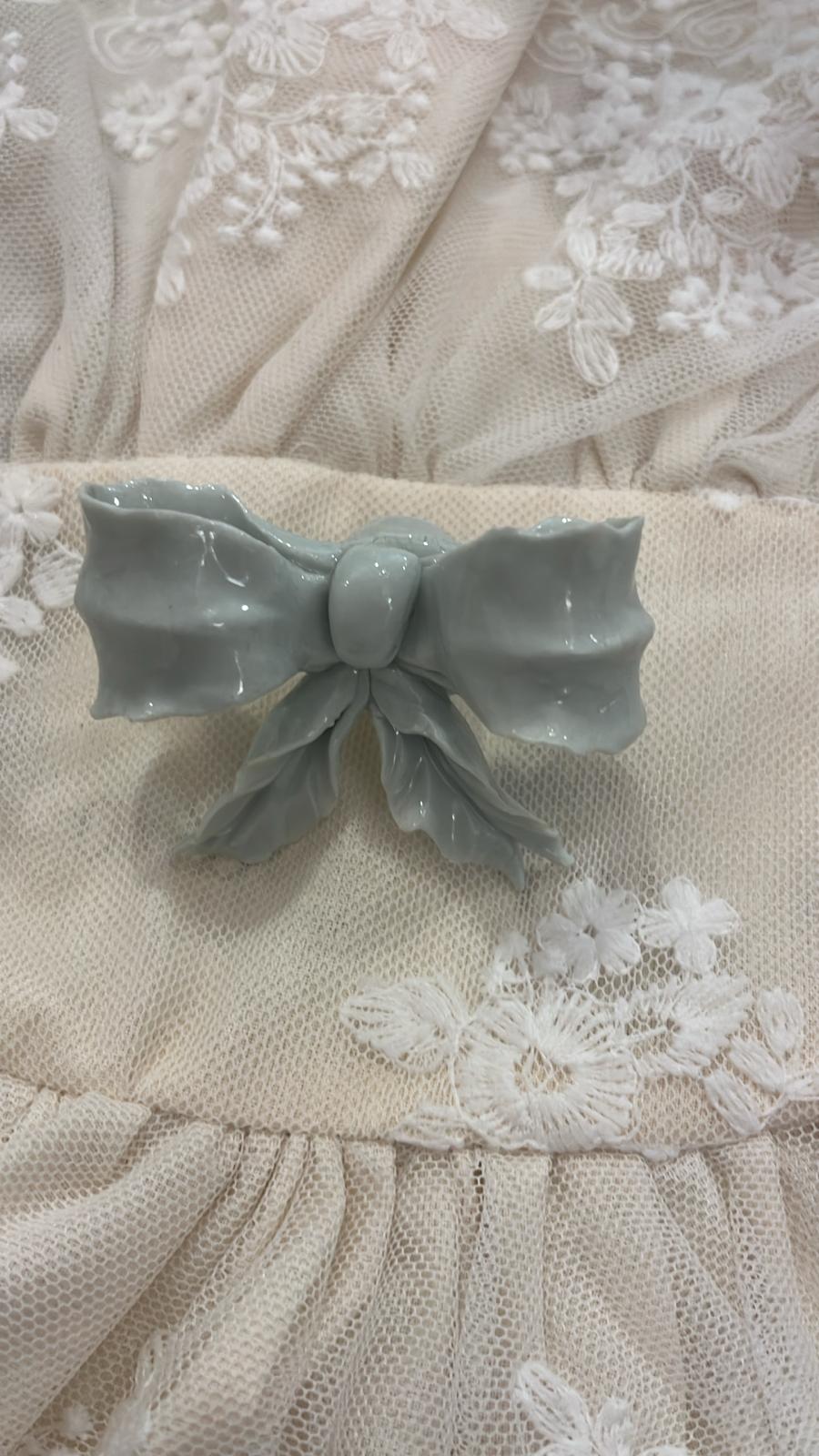 pomello decorativo in porcellana a forma di fiocco 6x5x4cm