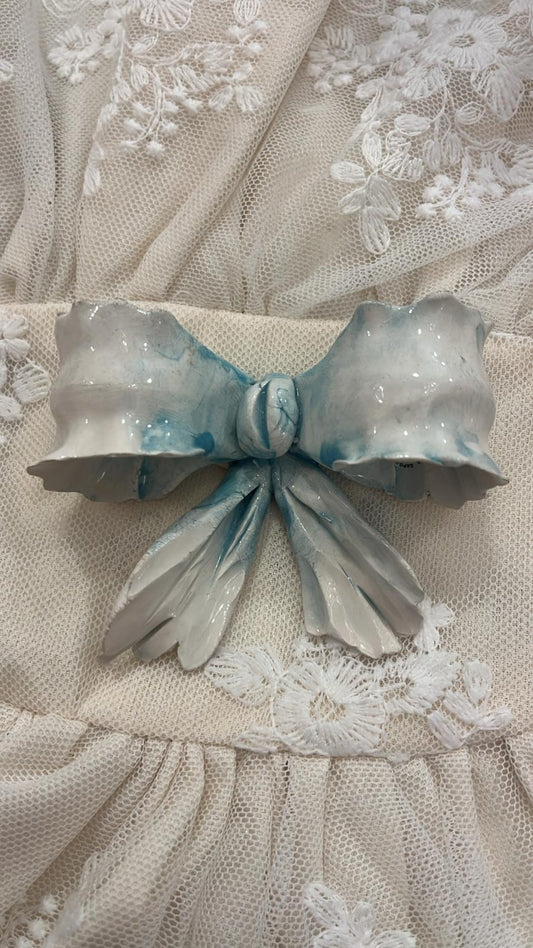 pomello decorativo in porcellana a forma di fiocco 8x7x3cm