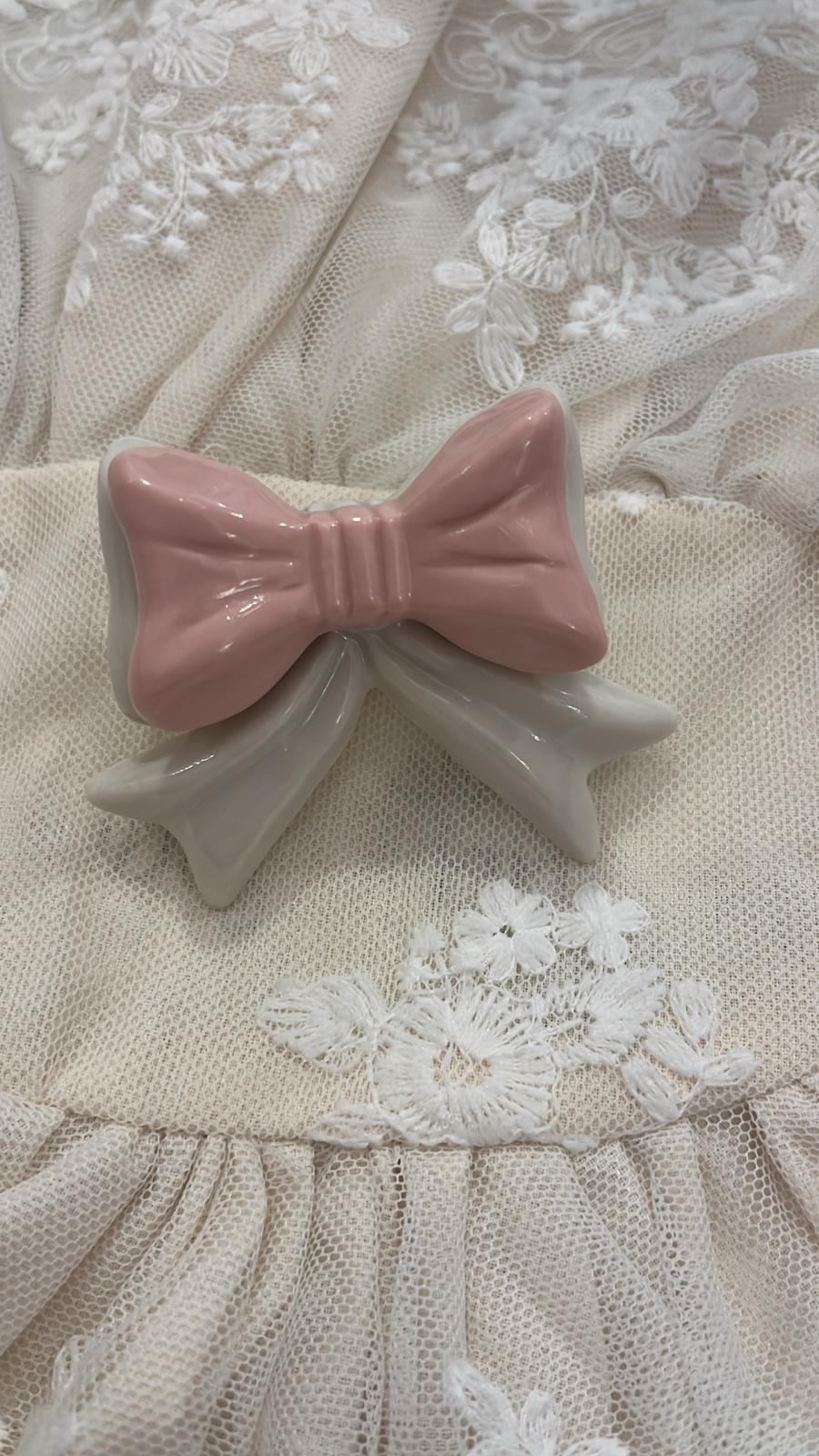 pomello decorativo in porcellana a forma di fiocco 5x6x4cm